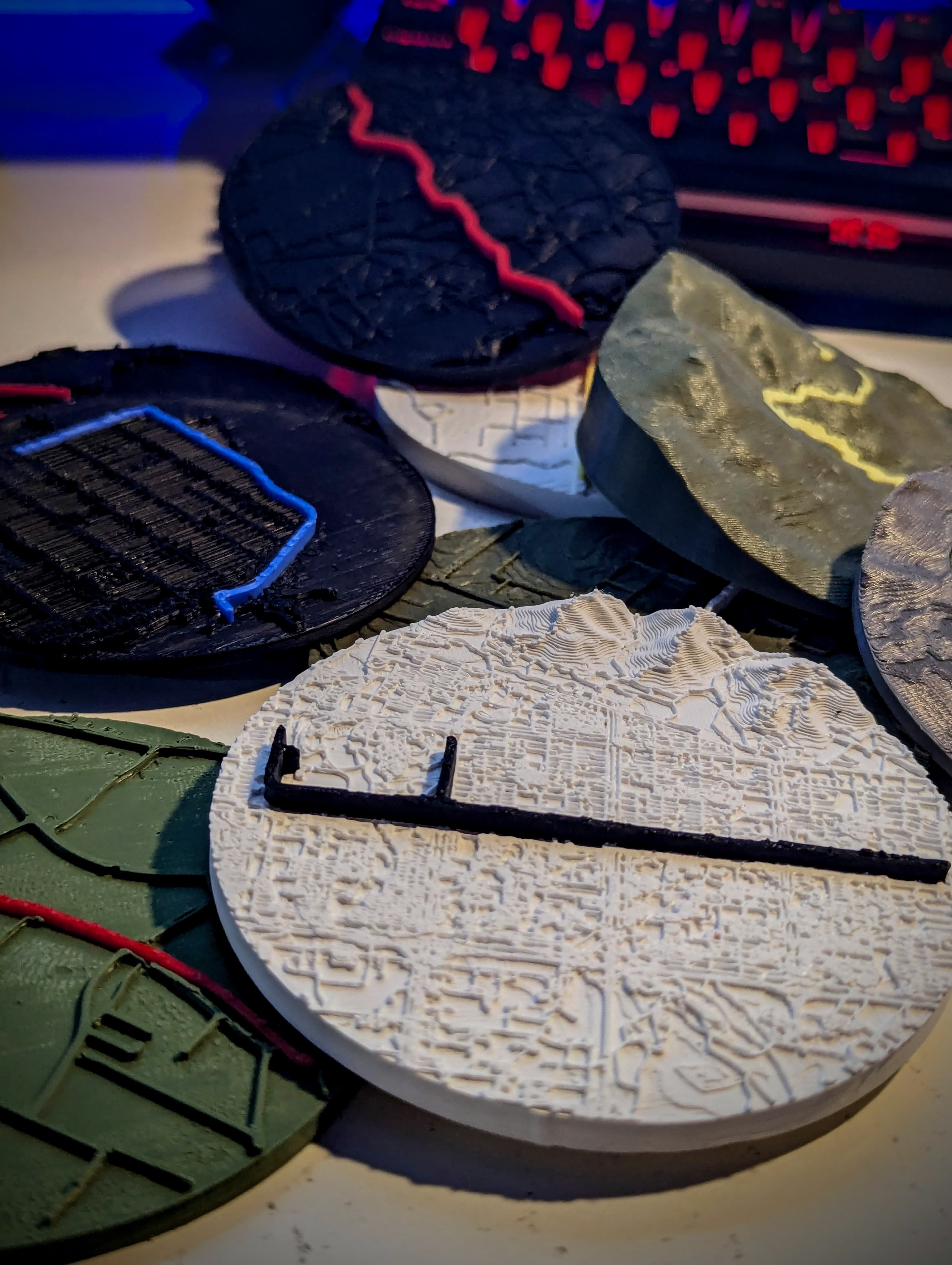 Collection of circular Peak terrain and route reliefs